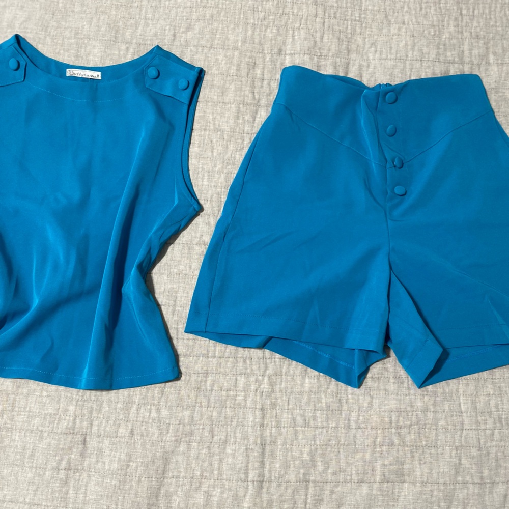 Blue shirt and shorts set very comfortable high waisted shorts never used